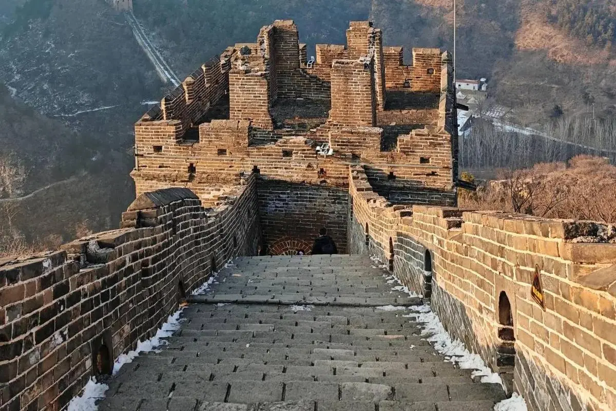 Ming watchtower looking down a restored stone stretch